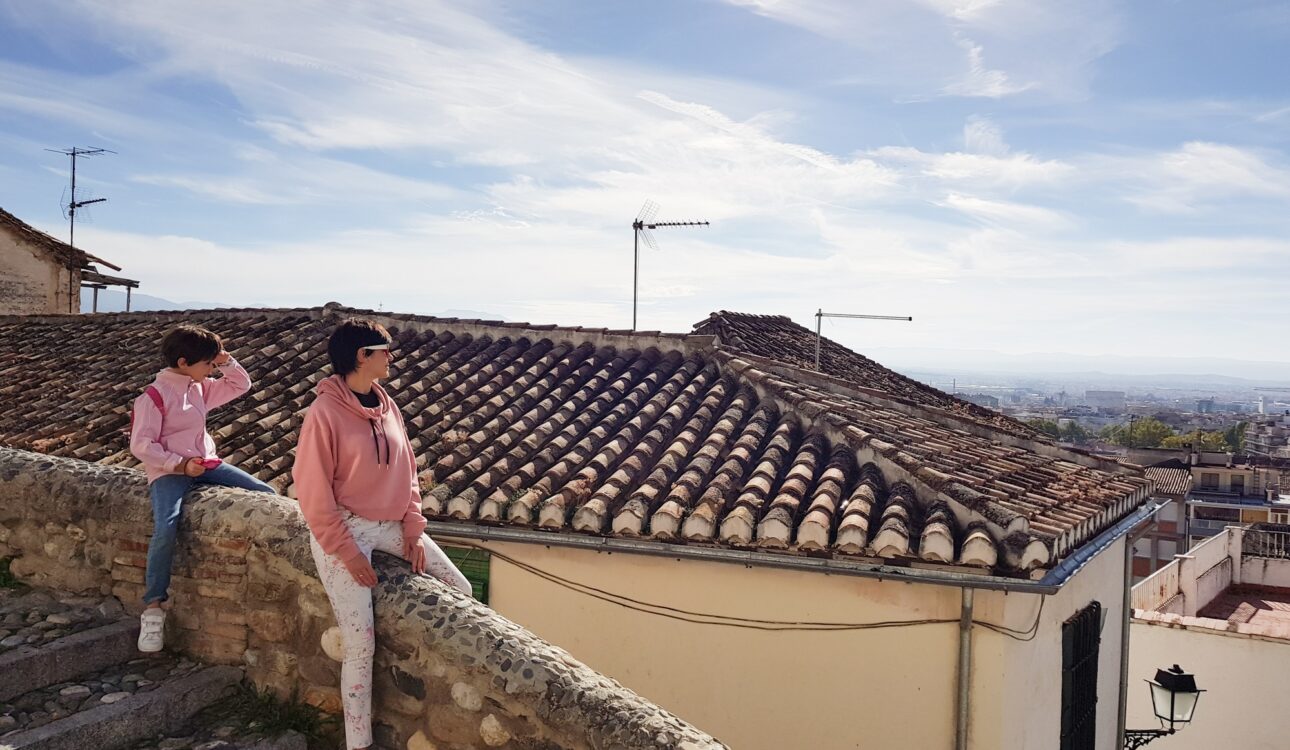 Mother and daughter enjoying the views of Granada from the Realejo neighborhood