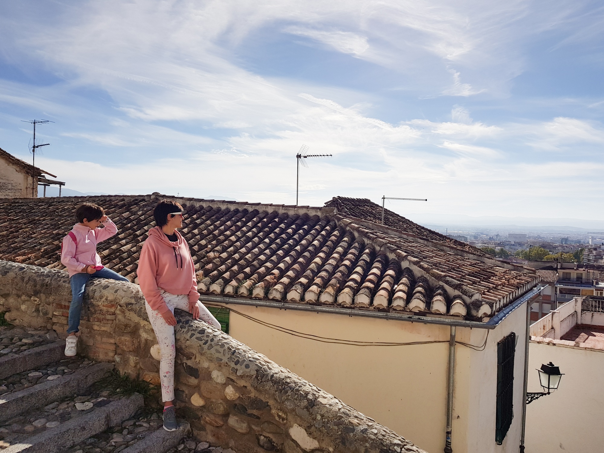 Mother and daughter enjoying the views of Granada from the Realejo neighborhood