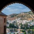 Alhambra arch and Granada cityscape