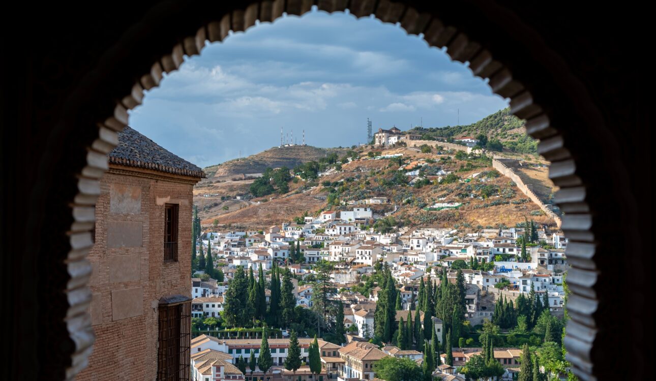 Alhambra arch and Granada cityscape