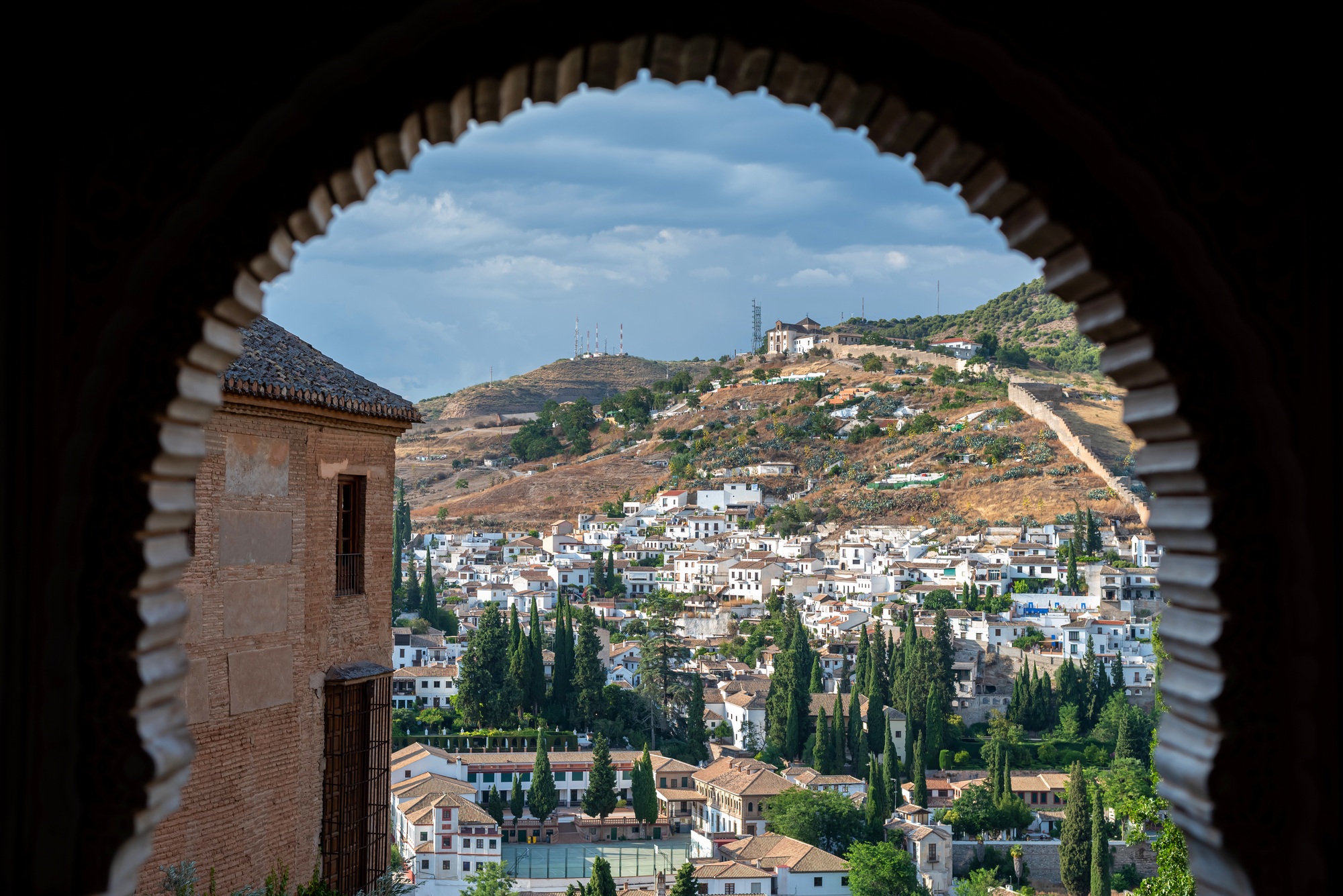 Alhambra arch and Granada cityscape