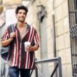 Young male traveler enjoying the streets of Granada, Spain