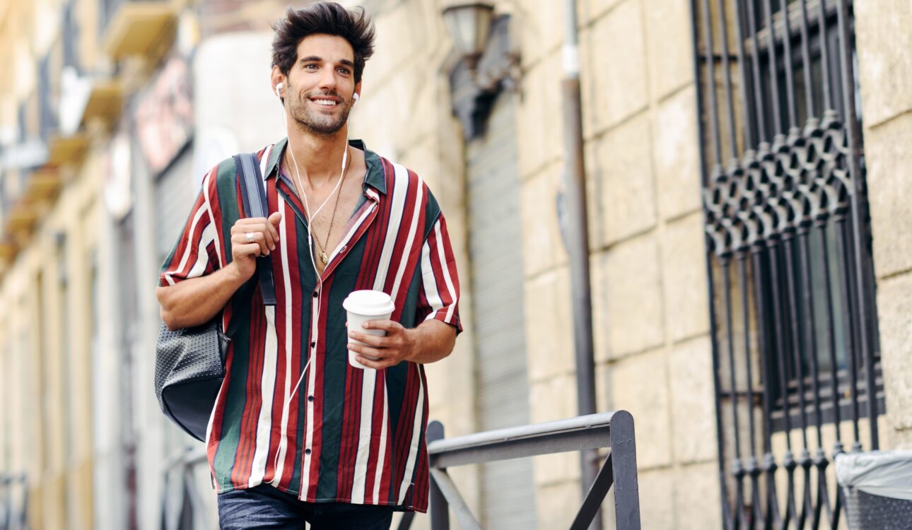 Young male traveler enjoying the streets of Granada, Spain