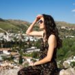 Tourist enjoying panoramic view of granada, spain