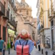 Woman tourist walking in old town of Granada Spain, travel concept. Travel alone