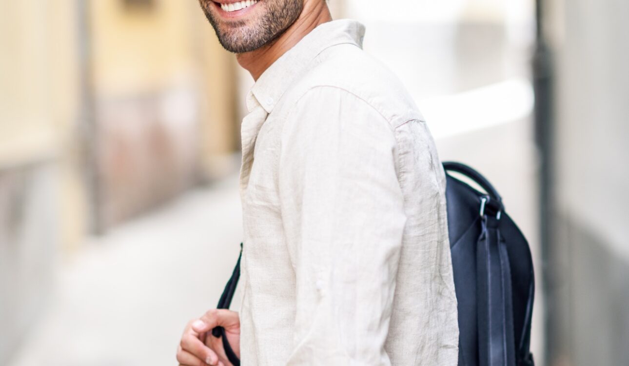 Young man sightseeing enjoying the streets of Granada